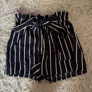 Blue and white striped paper bag shorts